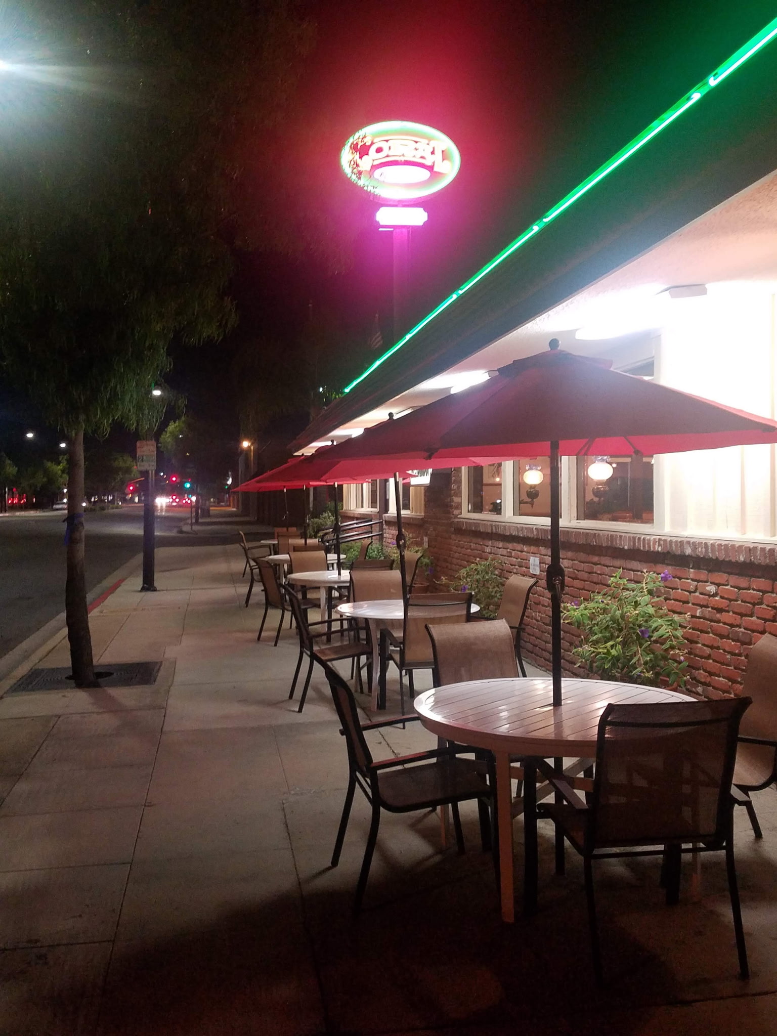 Coral Cafe sidewalk patio at night
